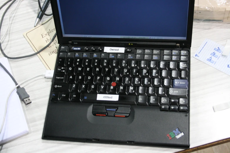 a close up of a laptop computer on a table