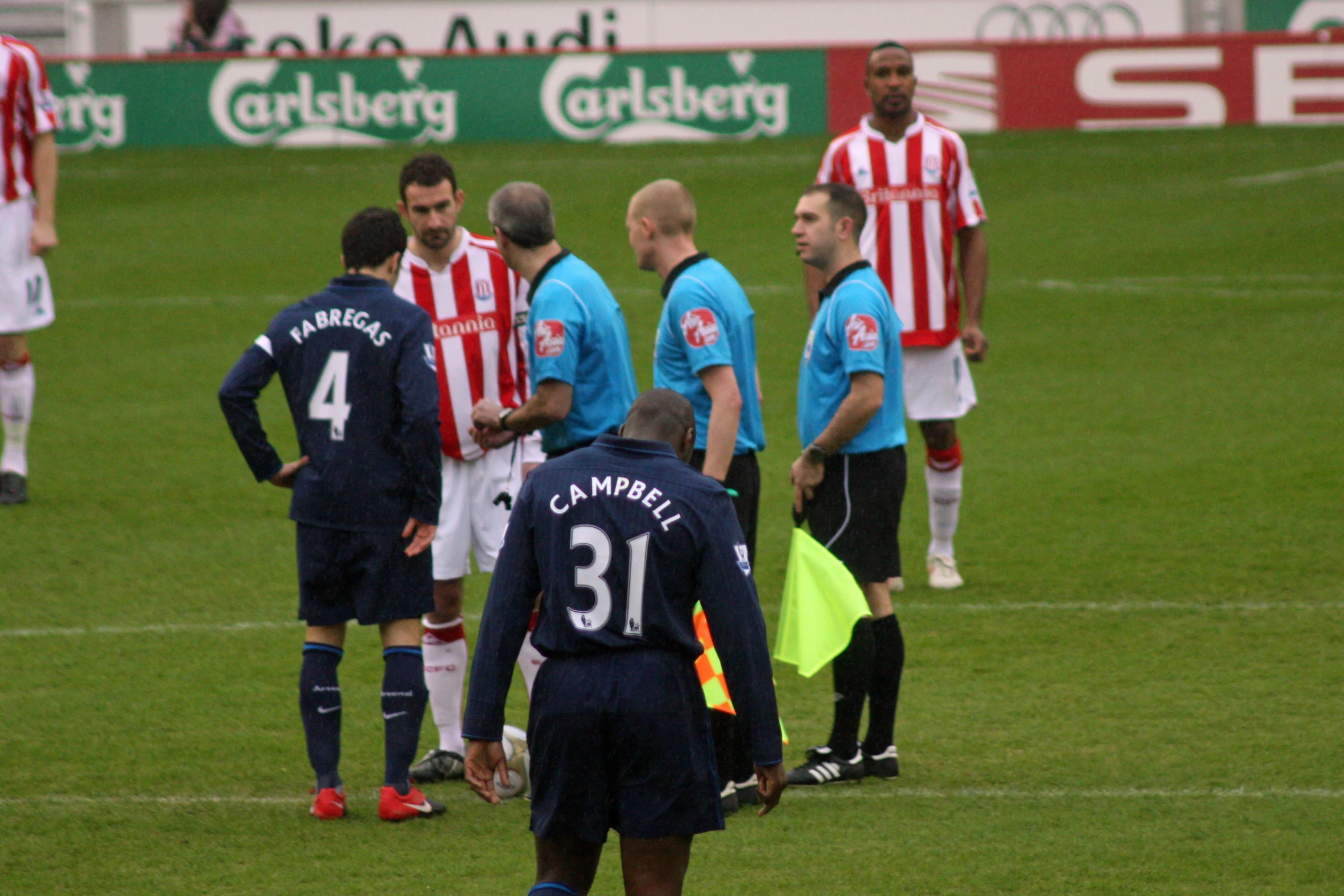 soccer team in blue jerseys at a match