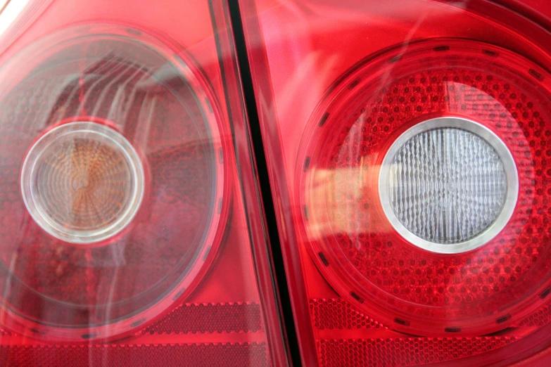 a close up image of a red tail lights