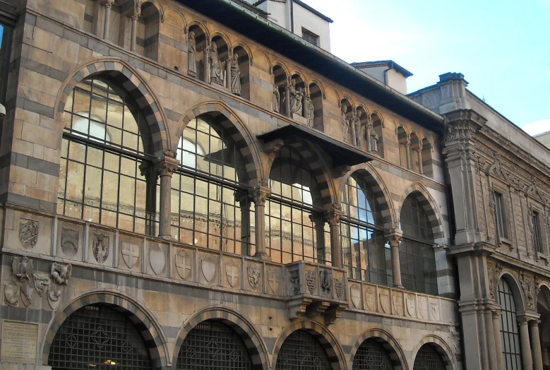 this is an old stone building with glass panes