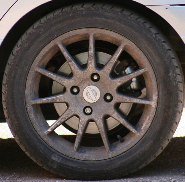 the front tire of a car is shown
