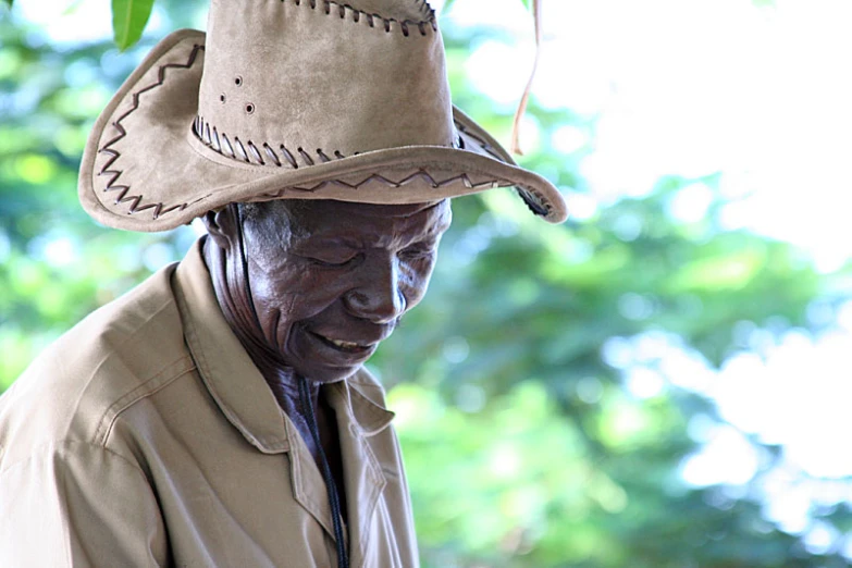 a man with a cowboy hat on his head