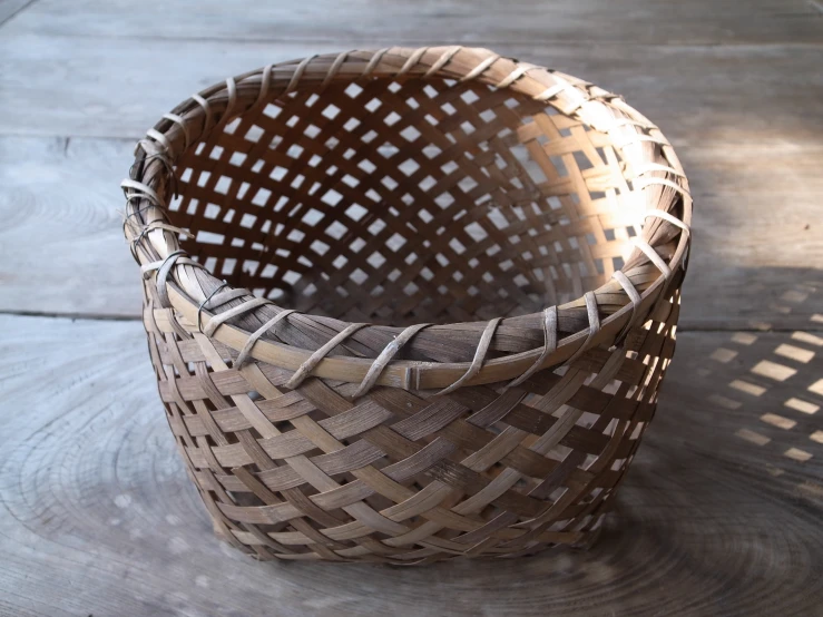 a small basket that has been woven with wicker