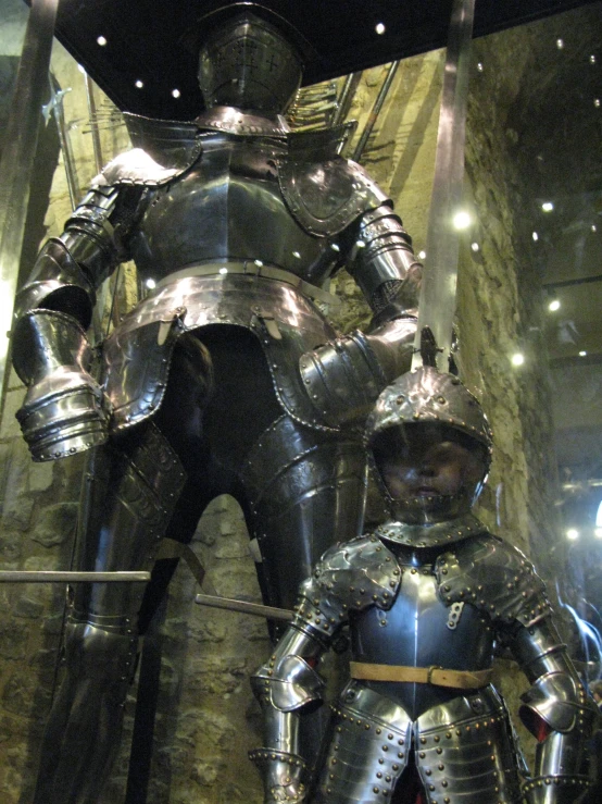 a knight with armor and sword on display