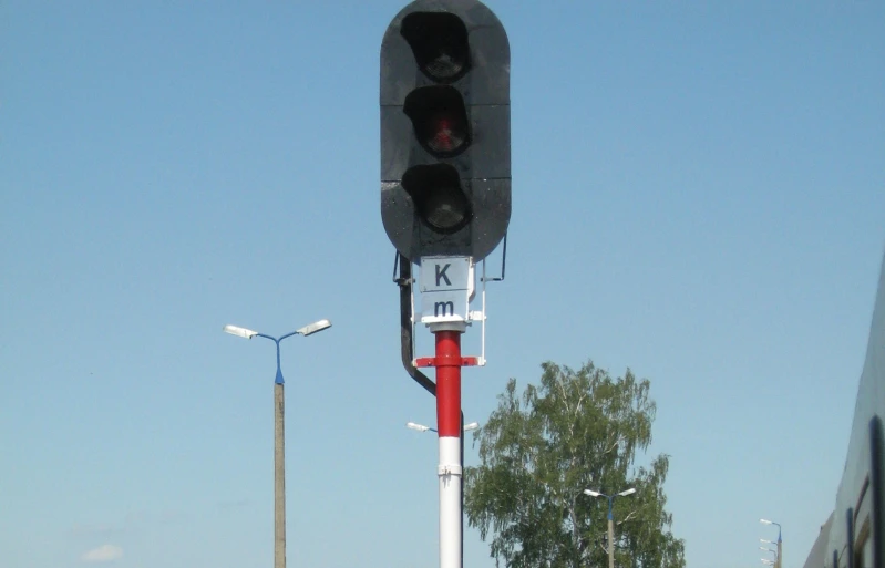 a traffic light on the street is red