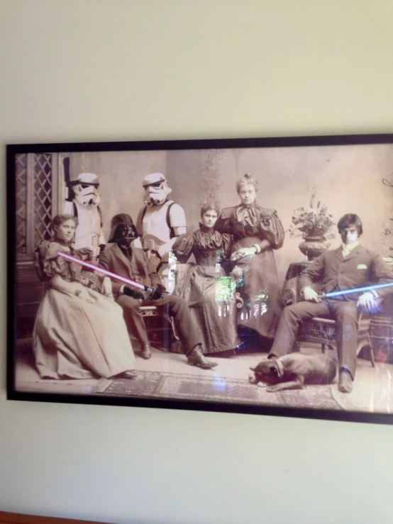 a group of people in costumes pose with star wars characters