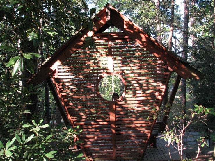 a wooden building is made from several sheets of wood