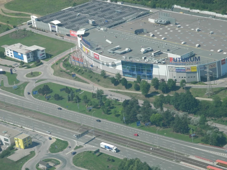 a view of a city with a road junction