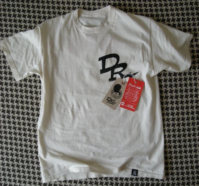 a white shirt that says b is for dog