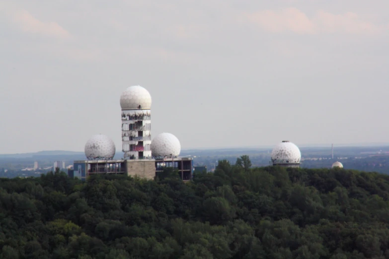 the large observatorys are shown near some trees