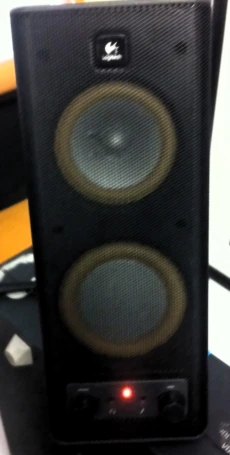 a speaker with speakers on the front and the back