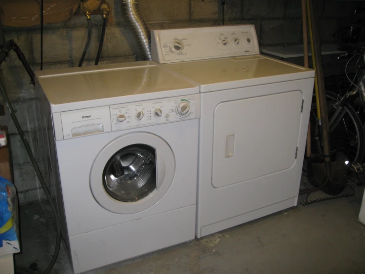 an image of washer and dryer in a garage