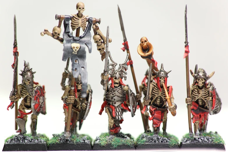 a miniature version of a skeleton - like warhammer and soldiers
