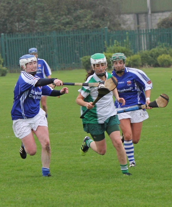 the players in action on the field playing with each other