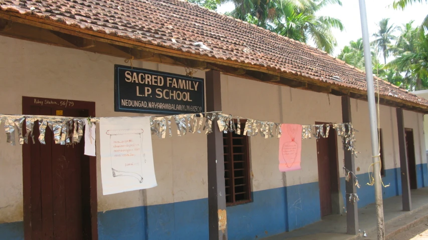 a sign outside a home in the country saying stored family up school