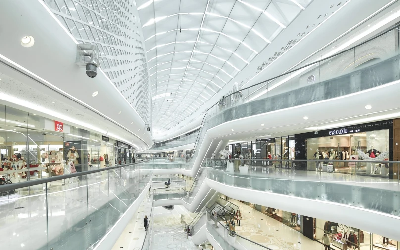 an empty shopping mall with a lot of stairs