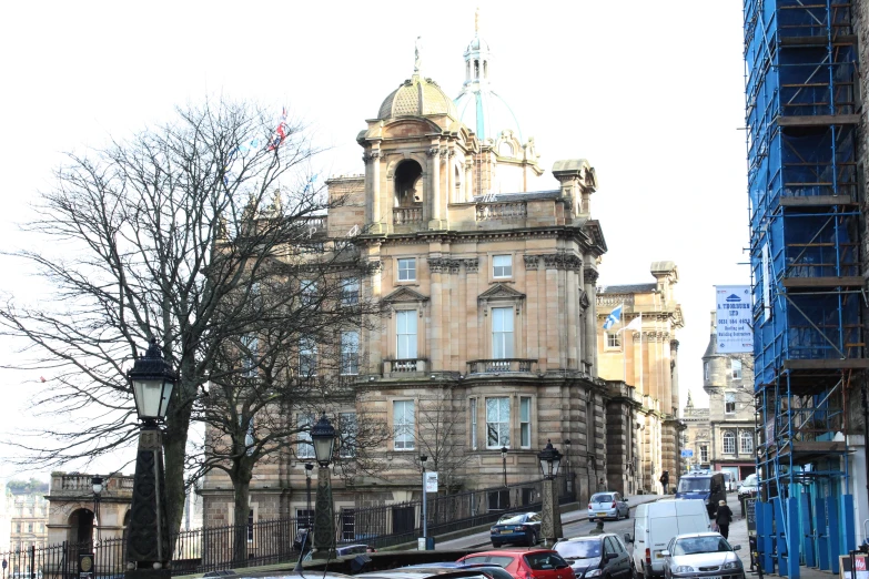 a building in the city has scaffolding on it