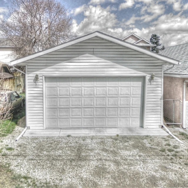 an image of an empty residential yard in winter