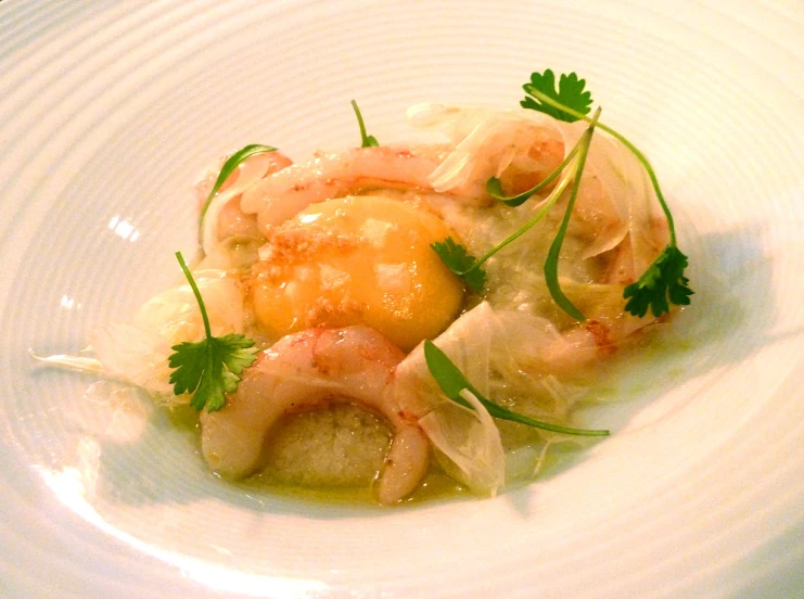 food items are served on a white plate