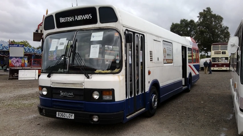 there are many buses parked on the street