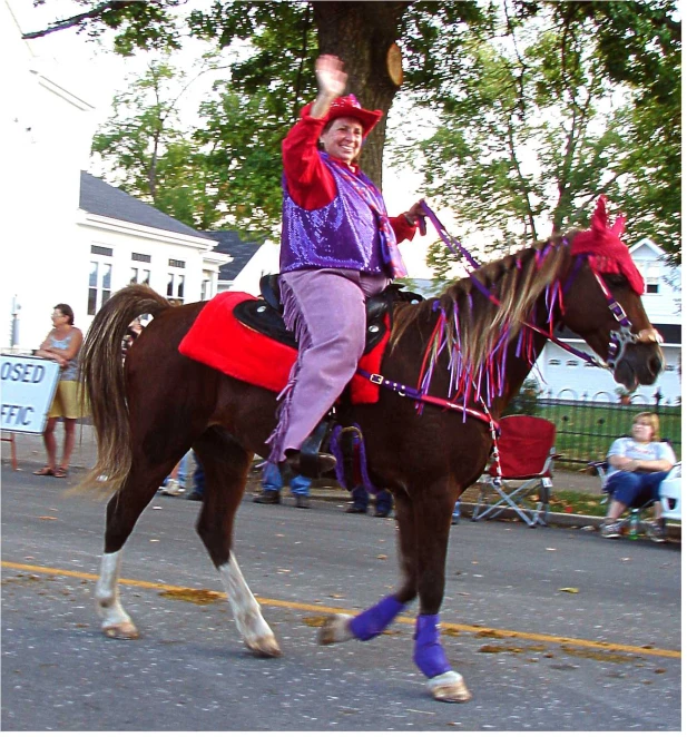 the man is on a horse during a parade