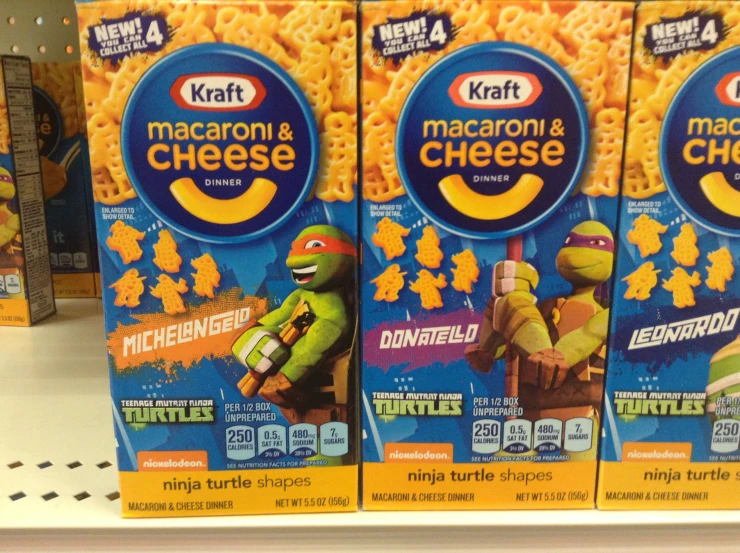 some packaged macaroni and cheese on a shelf