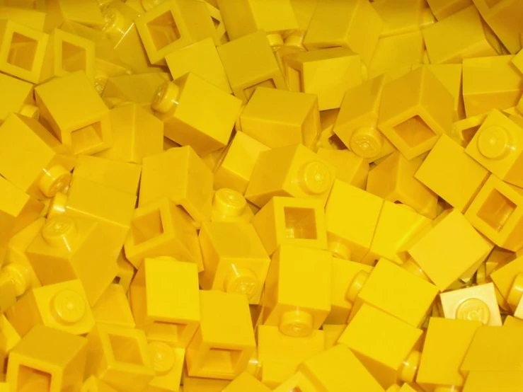 yellow legos stacked up with the center missing