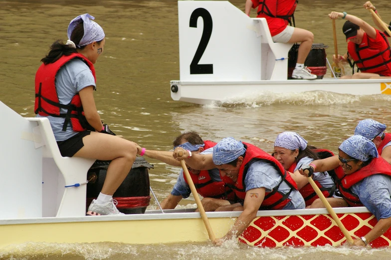 the people are enjoying their sport on the water