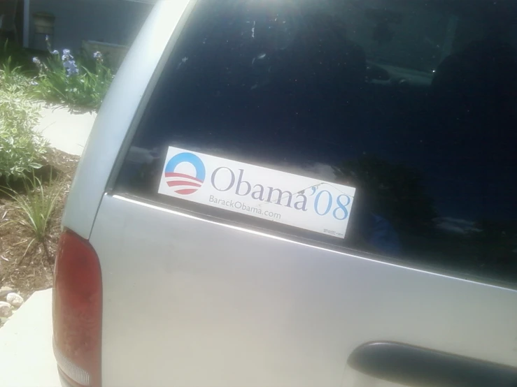 the obama license plate on the back of a vehicle