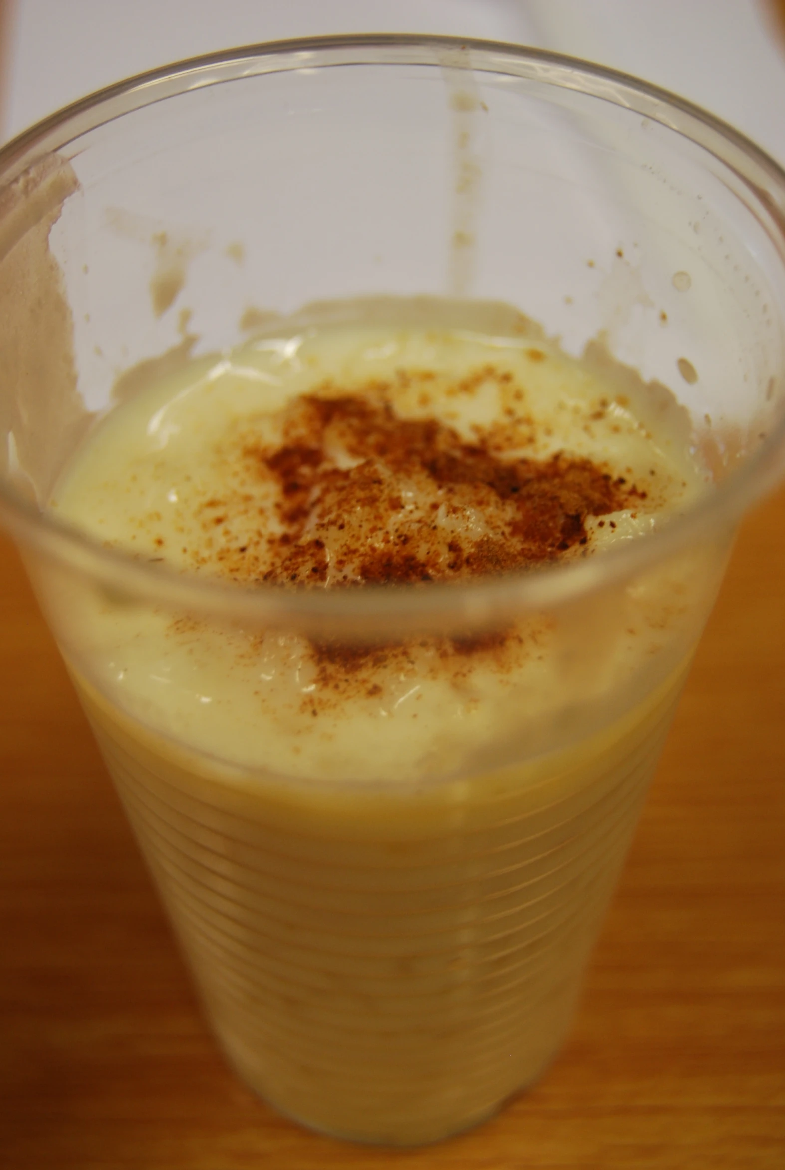 a small dessert drink with cinnamon in it