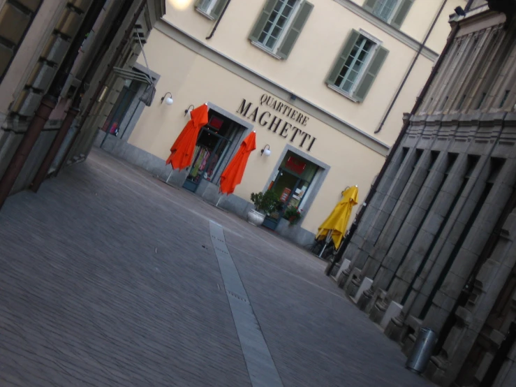 there are some clothes hanging on the corner of this street