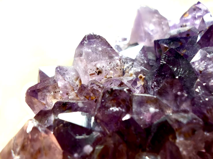 purple rocks are seen on a table