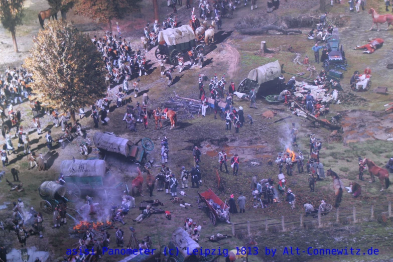 a large group of people standing on a hill