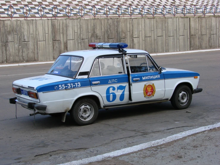 a police car parked on the side of the road