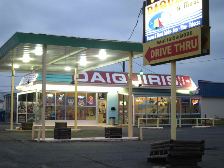 a drive thru drive in store sitting on a street