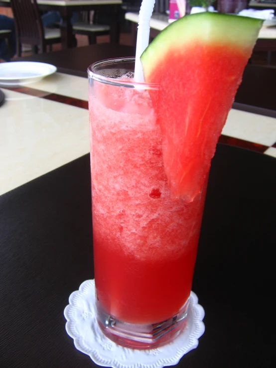 a watermelon drink is on a table