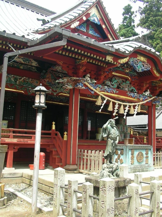 the japanese pavilion with the statue inside