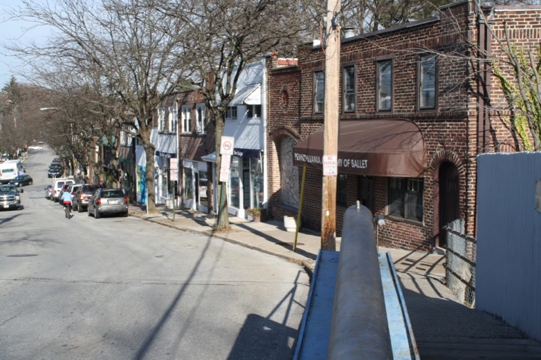 a city street with a lot of buildings on the side