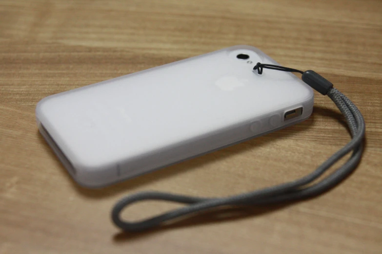 a white case is hooked up to an iphone