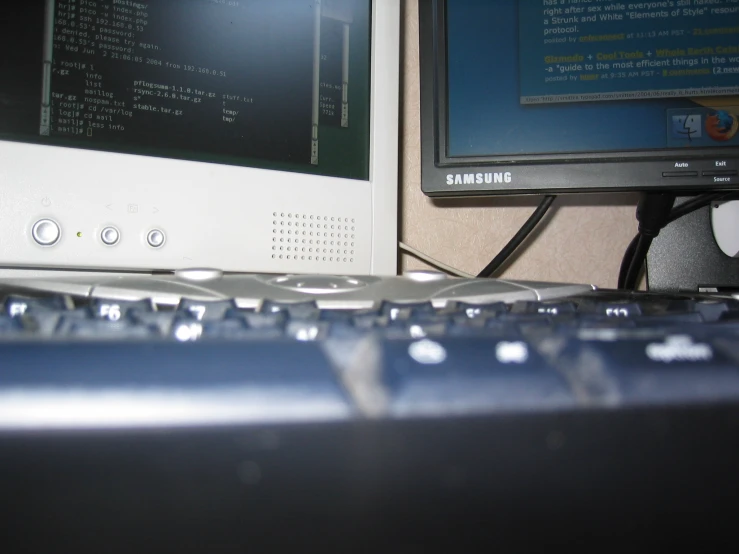 computer keyboard and monitor in dark room