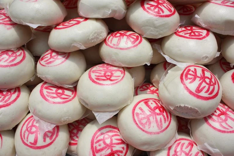 white, red and pink eggs wrapped in plastic wrap