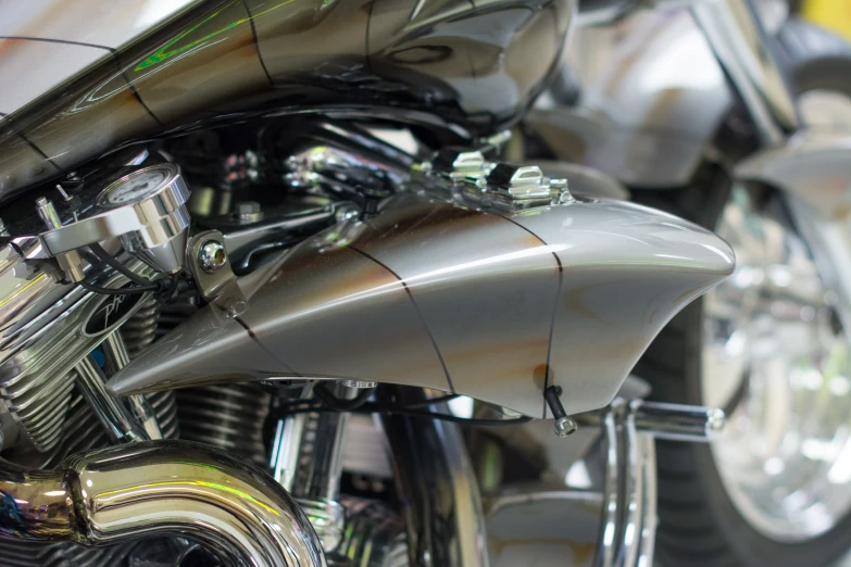 an intricate chrome motorcycle handlebars are seen in this image