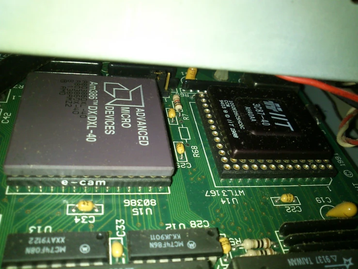 two chip's on top of the motherboard, wires and other electronic parts