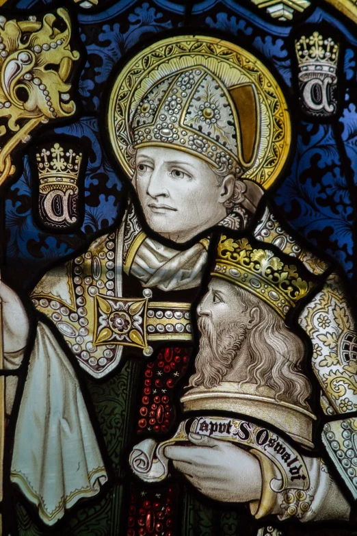 a man standing in front of a stained glass window