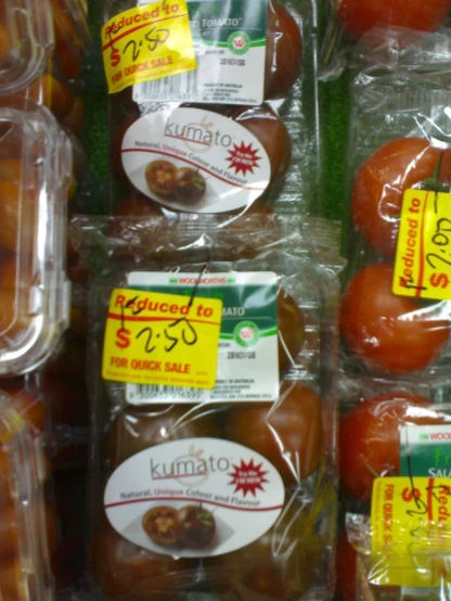 packaged tomatoes for sale in a grocery store