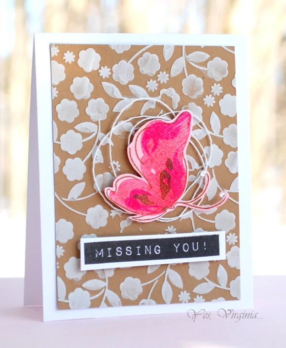 a greeting card with a flower and erfly