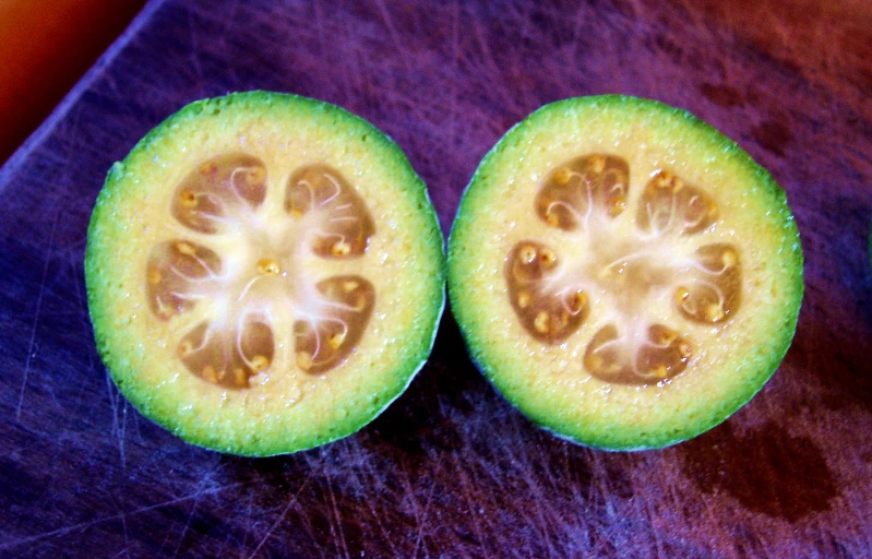 a fresh vegetable is cut into pieces and put on a  board