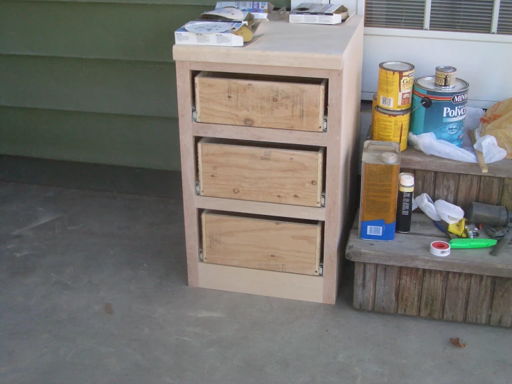 several different items are placed next to each other on a porch