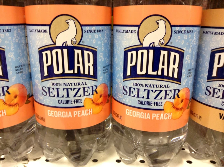 a display with bottles of polar seltzer in front of them
