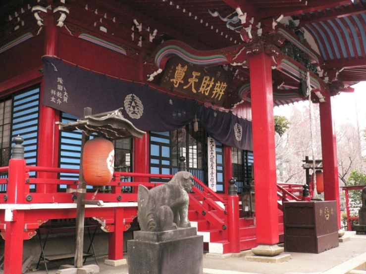 a building in a chinese country with many statues